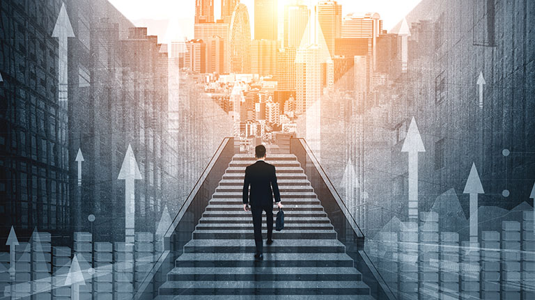 Ambitious business man climbing stairs to meet incoming challenge and business opportunity. The high stair represents the concept of career path success, future planning and business competitions.